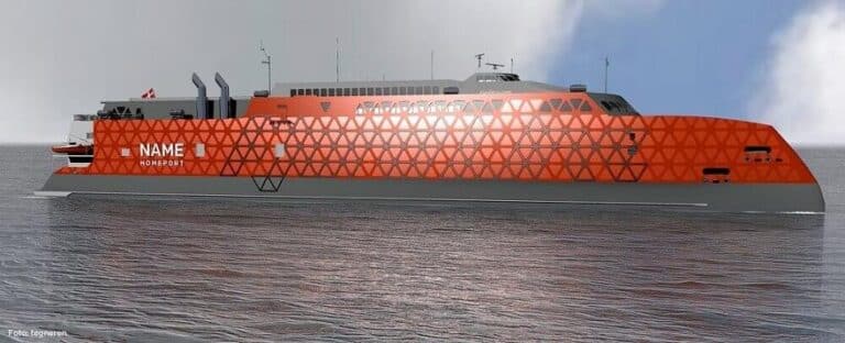 Una vista lateral de un gran barco rojo que navega por las profundas aguas azules del océano
