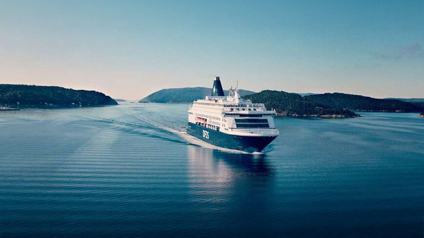A DFDS passenger ship sailing across the sea
