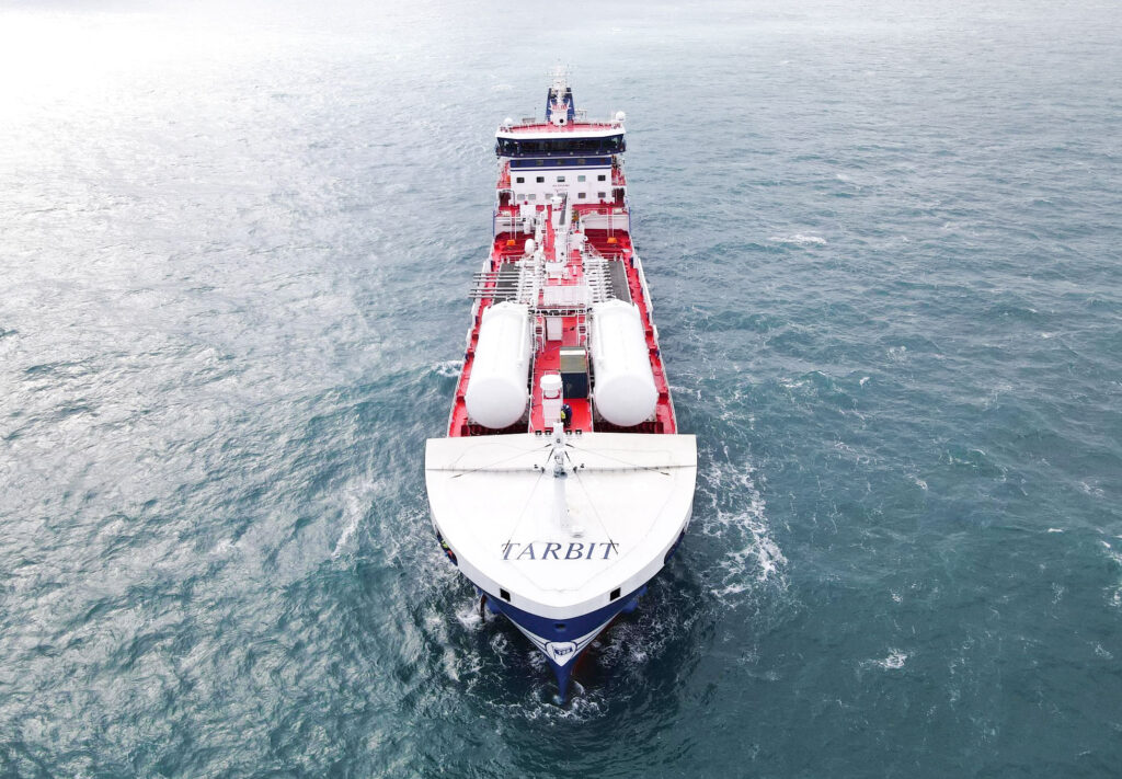 A bird perspective of TARBIT maritime vessel at sea - the view is from the front