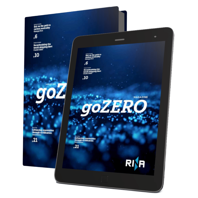 A mockup of a book and a tablet with RINA magazine goZERO