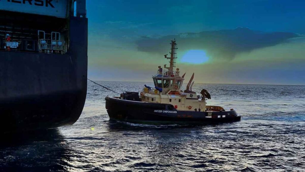 A SVITZER tugboat assisting a MERSK maritime vessel